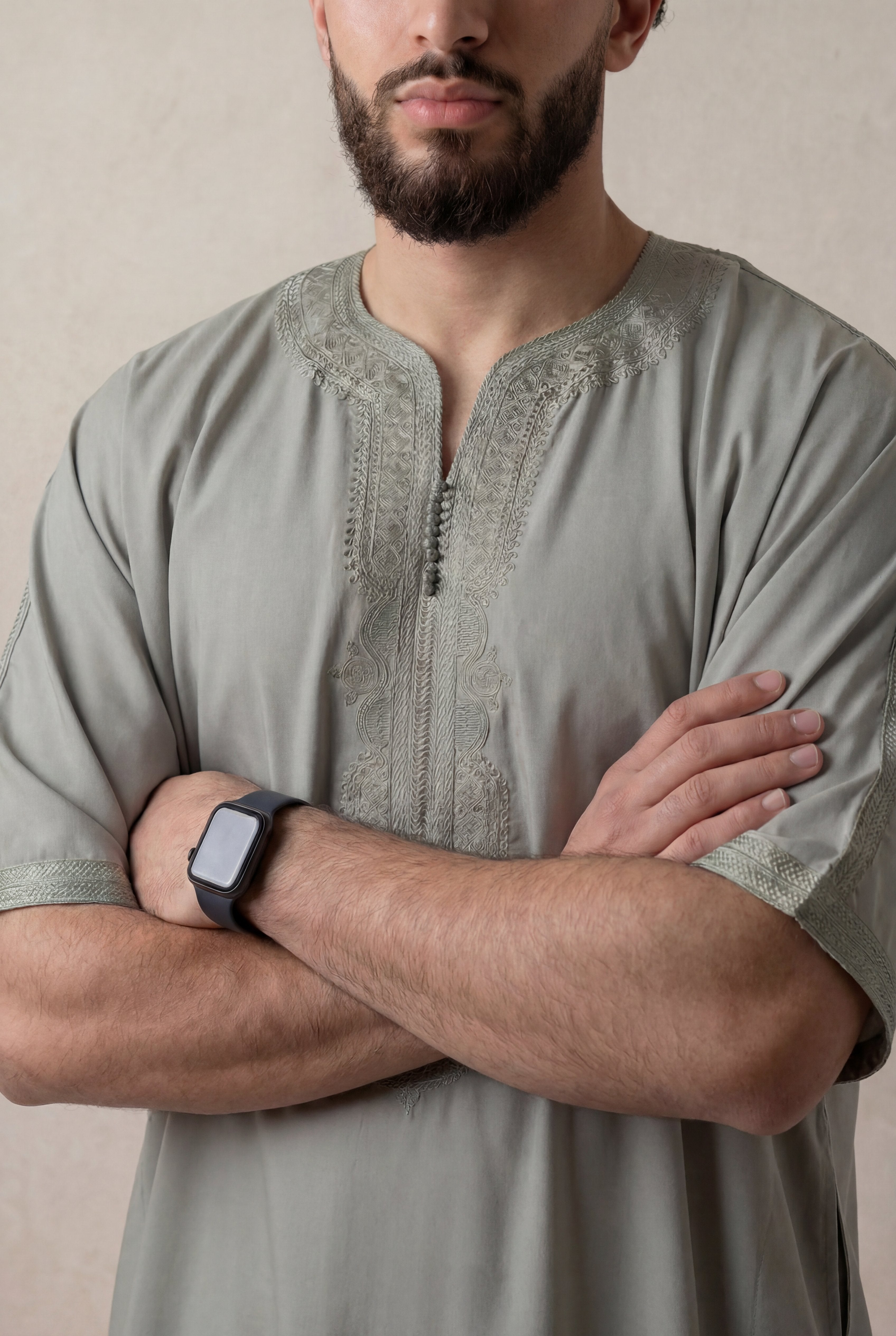 Moroccan Gandoura Sage Green Embroidery Detail – Arms Crossed Chest View